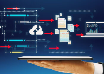 A hand holds a digital tablet. Above it, a flowchart unfolds, highlighting enterprise platforms with a path weaving through arrows and data icons toward a cloud sync icon. Finally, it connects to a laptop showcasing charts. The background is a gradient blue. | MONEY6X