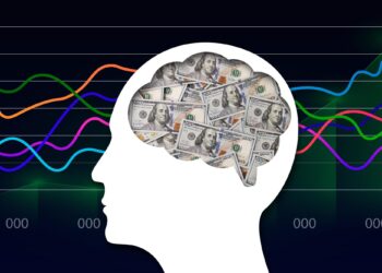 Silhouette of a human head with a brain filled with 100-dollar bills, set against a background of colorful financial line graphs.